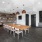 kitchen and dining area for residents with modern decor and comfy recliners