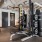 fitness center weight lifting equipment in large and open room