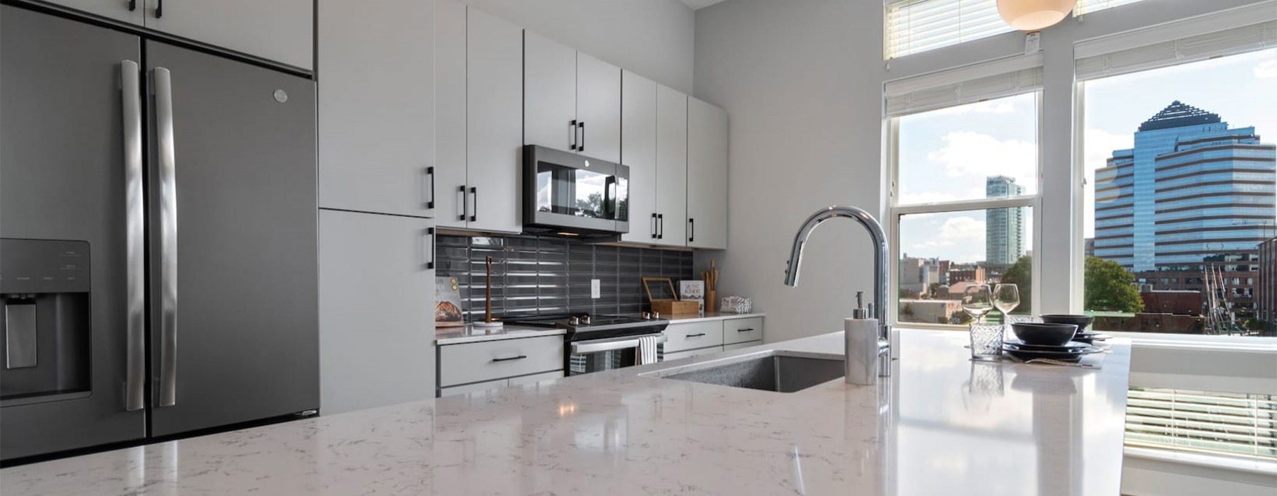 a kitchen with a granite counter top